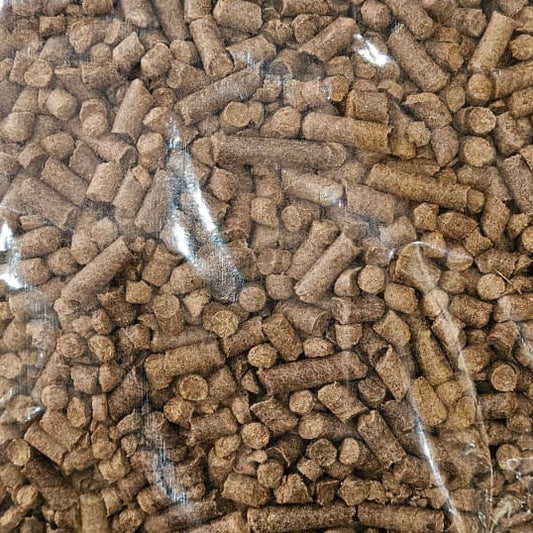 Bag of brown pellets on a white background